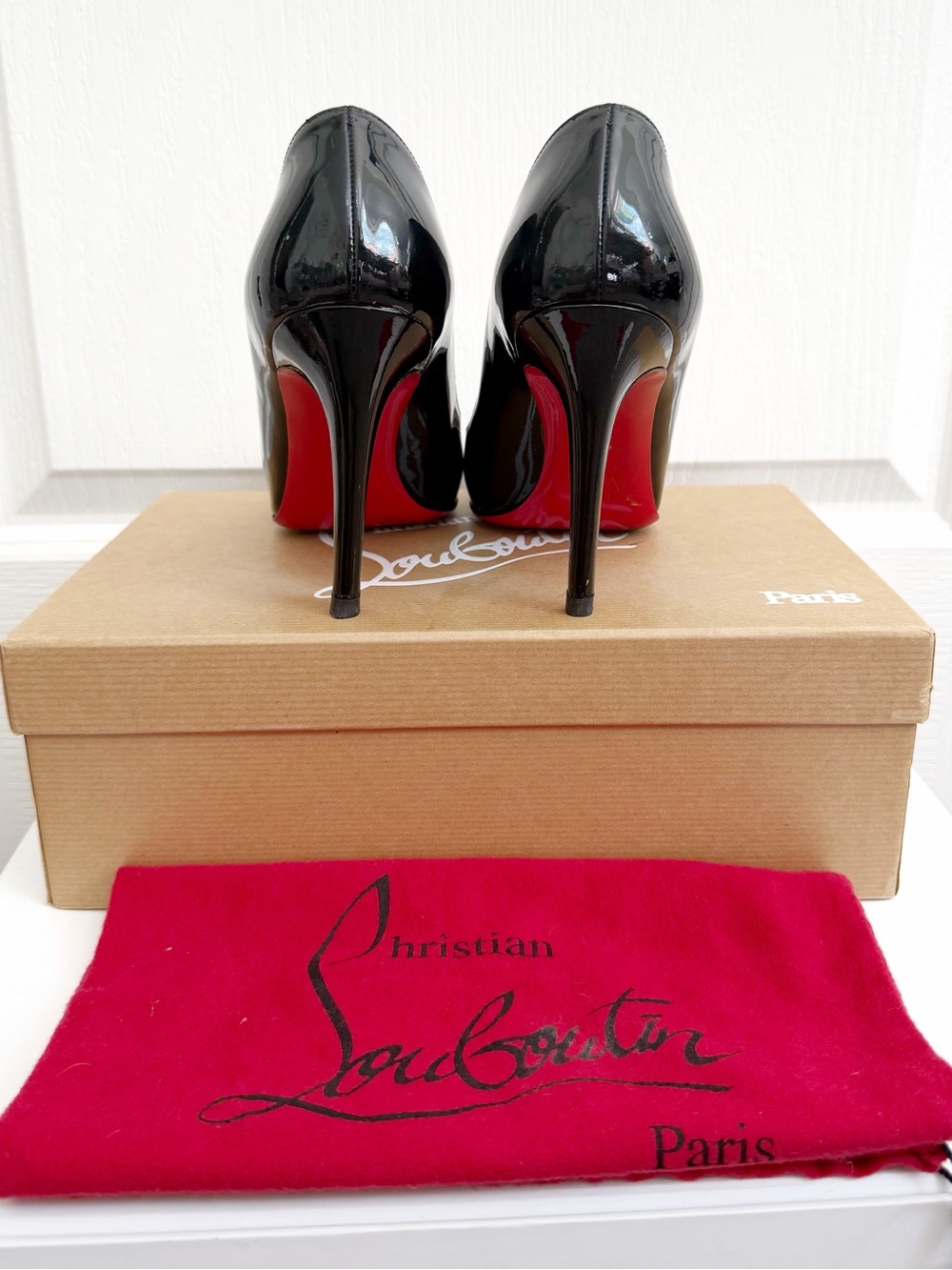 Christian Louboutin Black Patent Leather Pumps with Red Soles